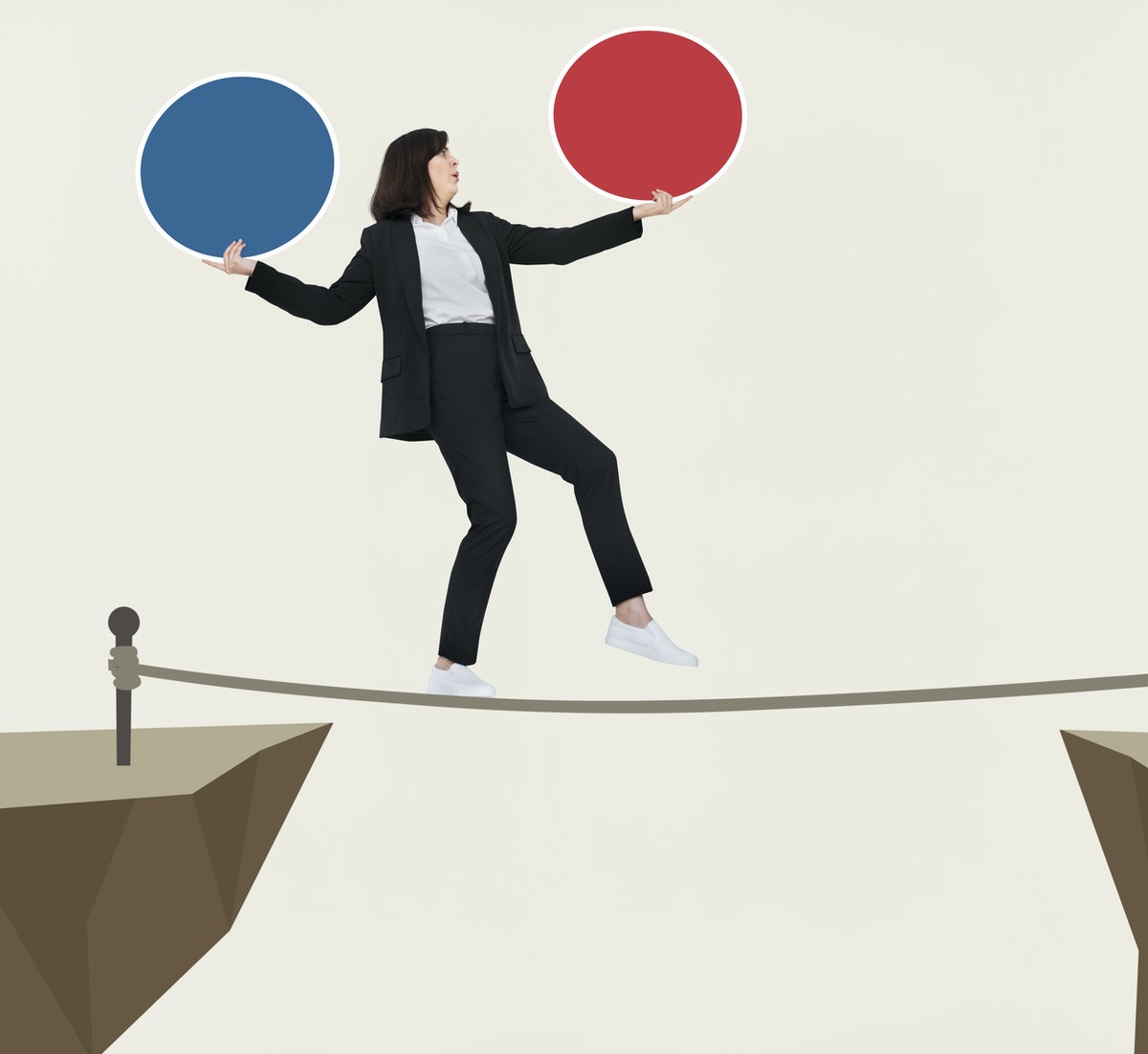 woman walking over a line, juggling two balls, one in each hand