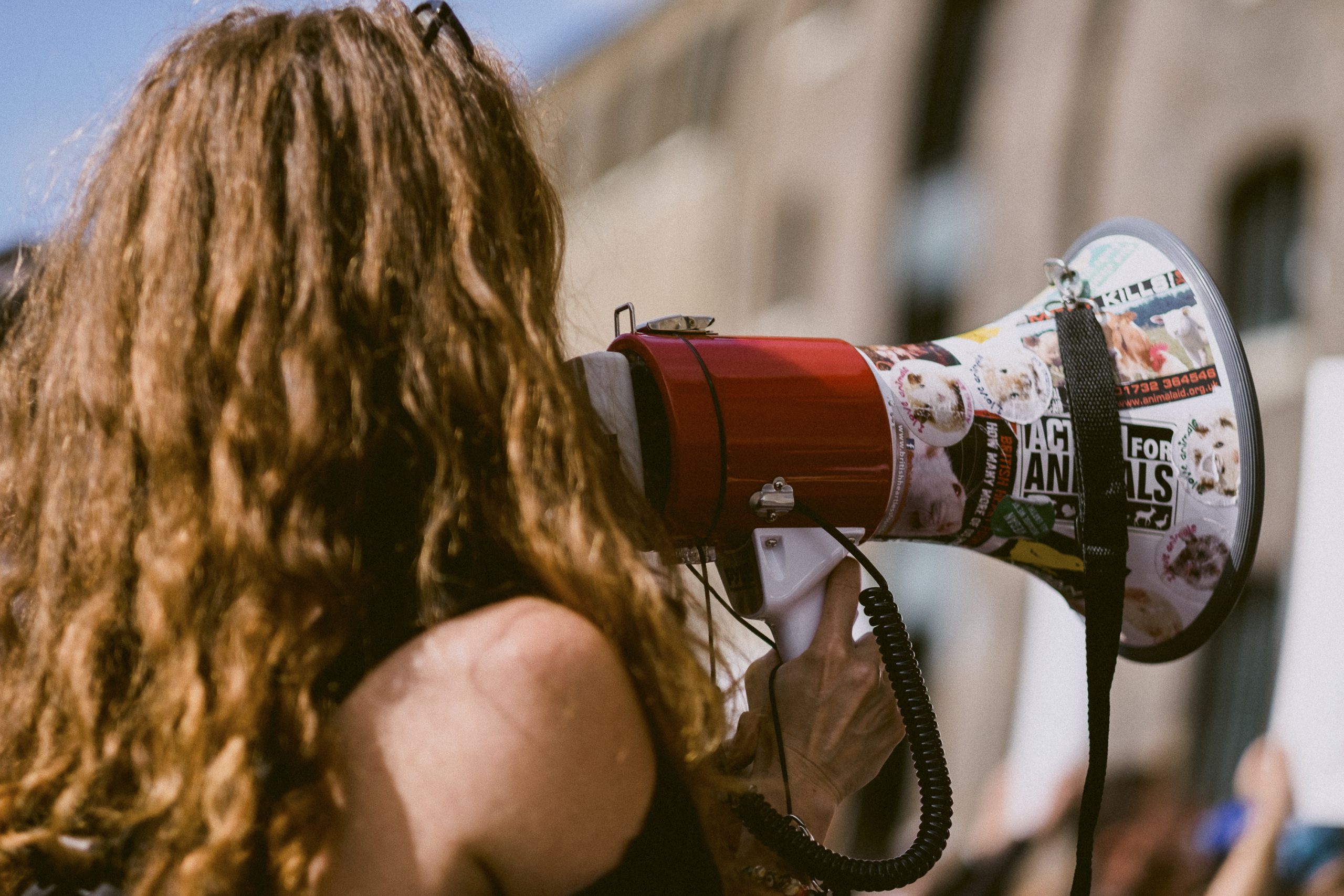 Woman speaking into a megaphone